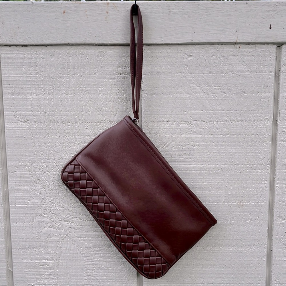 Leather clutch with woven detail